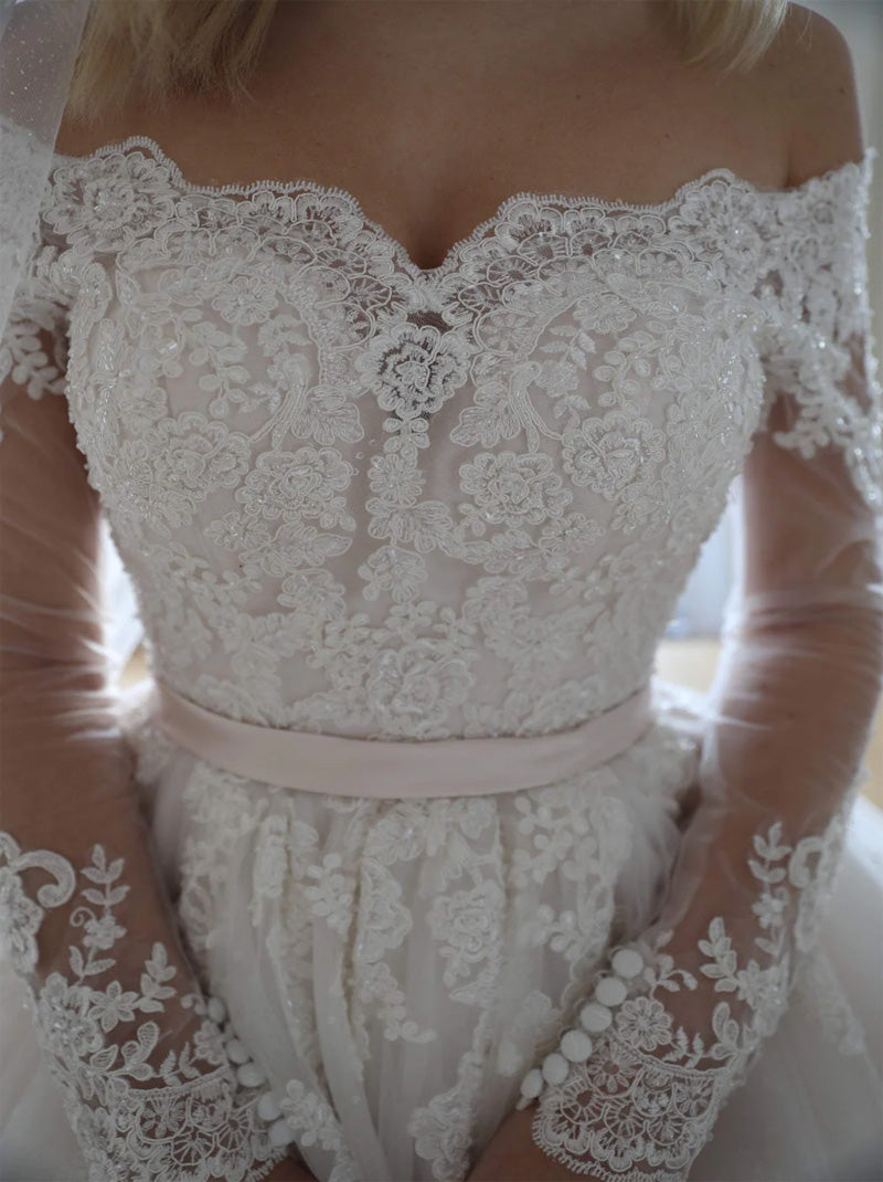 Luxurious Ball Gown Wedding Dresses Off The Shoulder Beads Appliques Belt Illusion Long Sleeves Tulle Court Train Bridal Gowns Custom Made