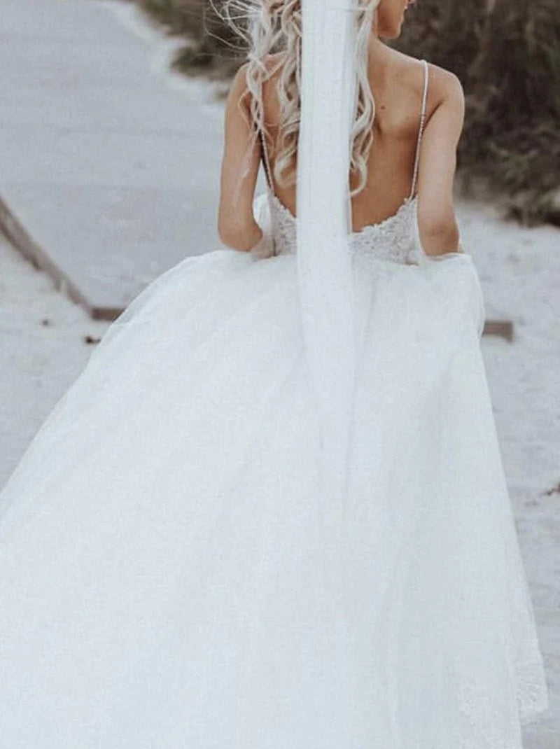 Modern Ball Gown Wedding Dresses Spaghetti Beads Appliqued Backless Sleeveless Sweep Train Tulle Bridal Gowns Custom Made