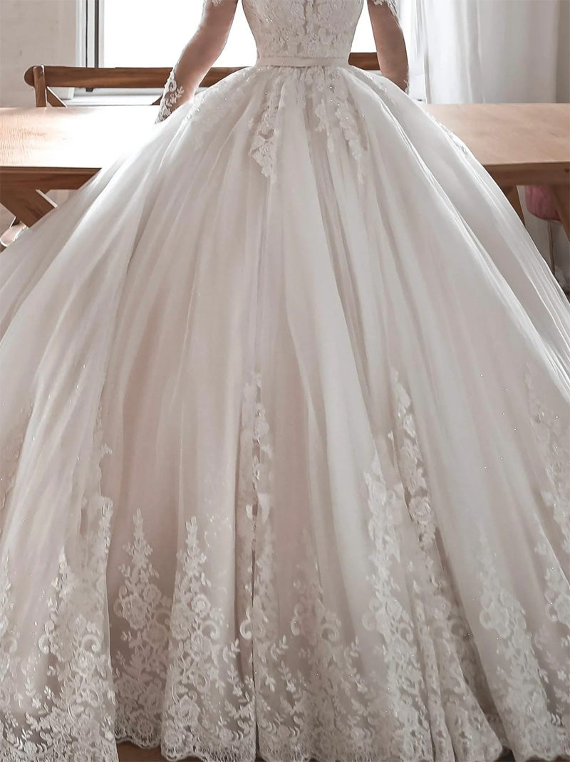 Charming Ball Gown Wedding Dresses Sweetheart Appliques Beads Illusion Long Sleeves Tulle Court Train Bridal Gowns