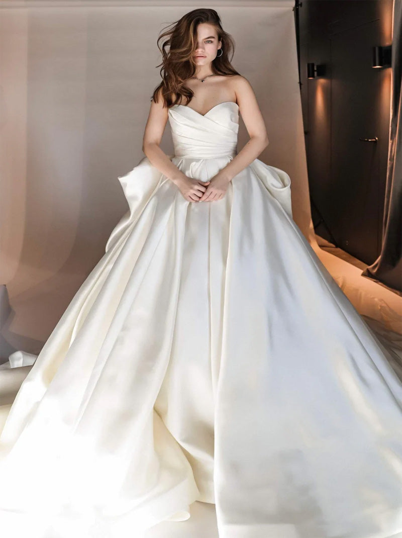 Elegant A-Line Wedding Dresses Sweetheart Pleated Ruched Bowknot Sleeveless Court Train Satin Bridal Gowns Custom Made