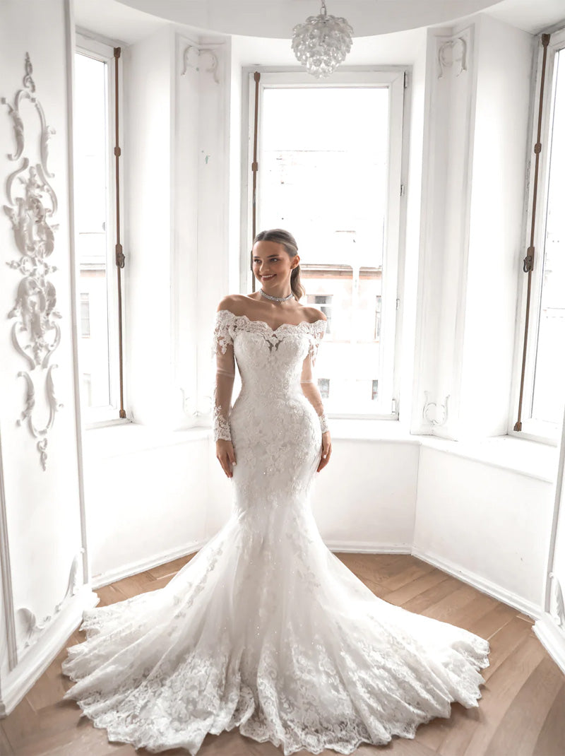 Luxurious Mermaid Wedding Dresses Off The Shoulder Beaded Appliqued Lace Illusion Long Sleeves Covered Buttons Tulle Bridal Gowns Custom Design With Detachable Long Train