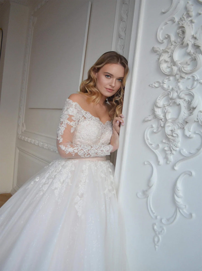 Luxurious Ball Gown Wedding Dresses Off The Shoulder Beads Appliques Belt Illusion Long Sleeves Tulle Court Train Bridal Gowns Custom Made