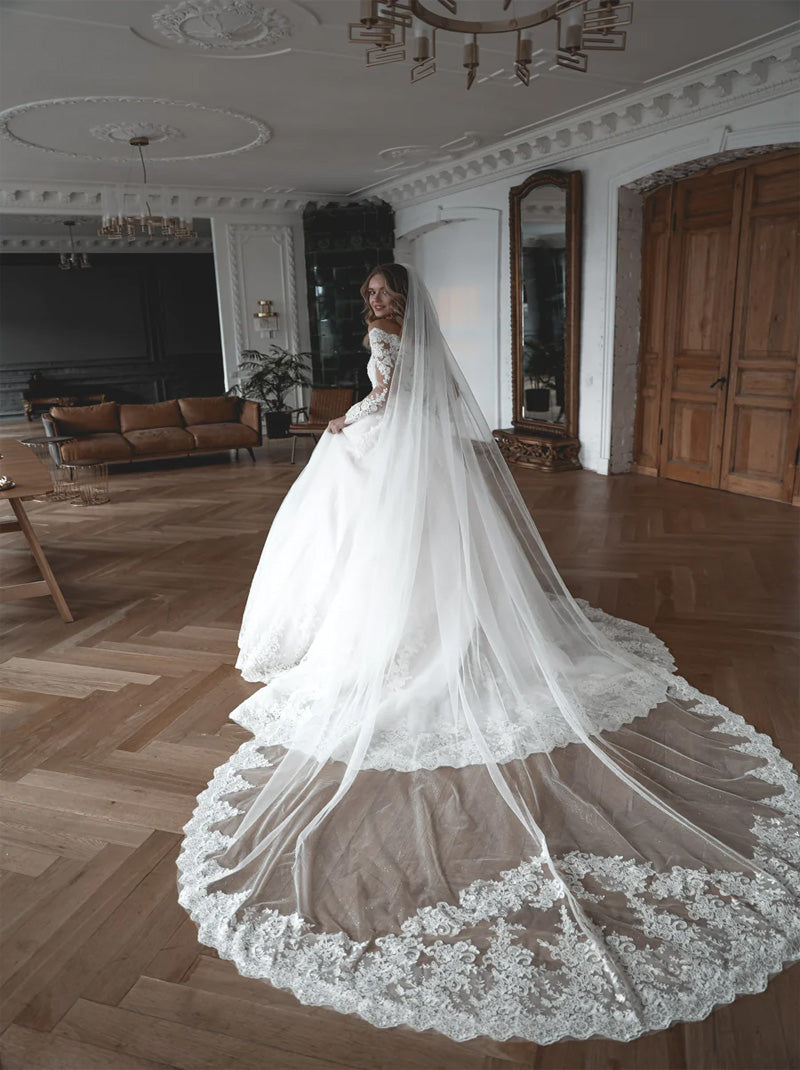 Luxurious Ball Gown Wedding Dresses Off The Shoulder Beads Appliques Belt Illusion Long Sleeves Tulle Court Train Bridal Gowns Custom Made