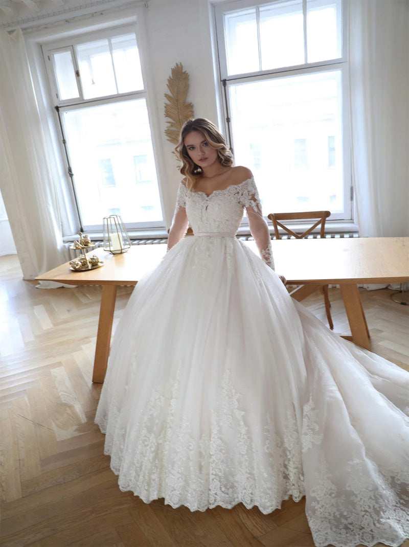 Luxurious Ball Gown Wedding Dresses Off The Shoulder Beads Appliques Belt Illusion Long Sleeves Tulle Court Train Bridal Gowns Custom Made
