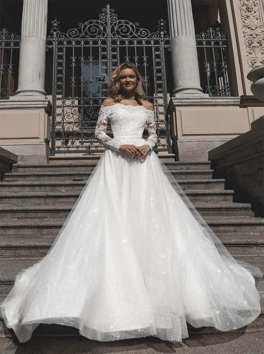 Luxurious A-Line Wedding Dresses Off The Shoulder Illusion Long Sleeves Appliques Beads Court Train Tulle Bridal Gowns Custom Made