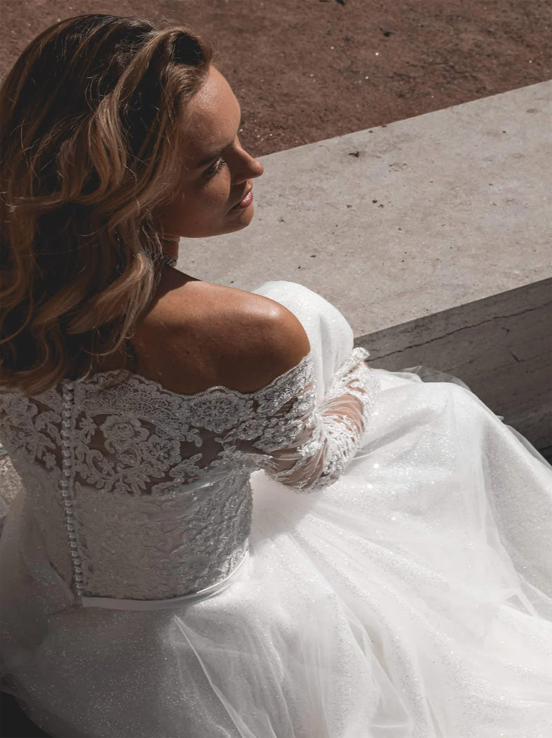 Luxurious A-Line Wedding Dresses Off The Shoulder Illusion Long Sleeves Appliques Beads Court Train Tulle Bridal Gowns Custom Made