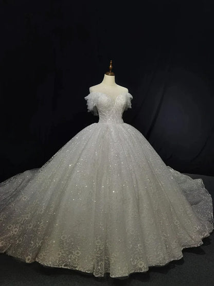 Sparkling Ball Gown Wedding Dresses Sweetheart Cap Sleeves Sequins Beads Appliques Court Train Tulle Bridal Gowns Custom Design