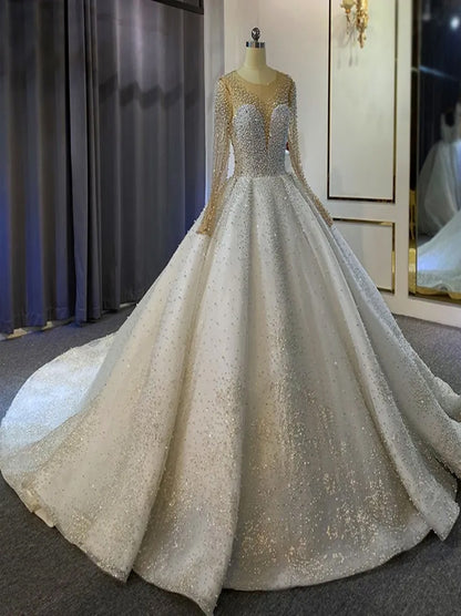 Sparkling Ball Gown Wedding Dresses Scoop Beads Crystals Illusion Long Sleeves Tulle Court Train Bridal Gowns Custom Made