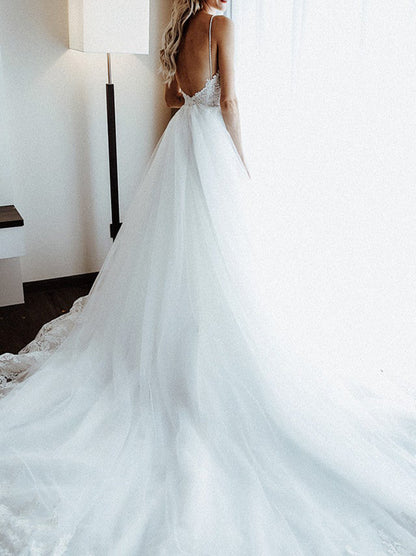 Modern Ball Gown Wedding Dresses Spaghetti Beads Appliqued Backless Sleeveless Sweep Train Tulle Bridal Gowns Custom Made