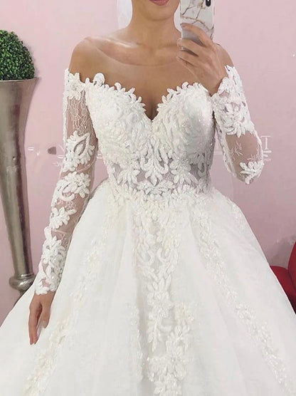 Charming Ball Gown Wedding Dresses Illusion Scoop Appliqued Beads Long Sleeves Covered Buttons Court Train Tulle Bridal Gowns Custom Made