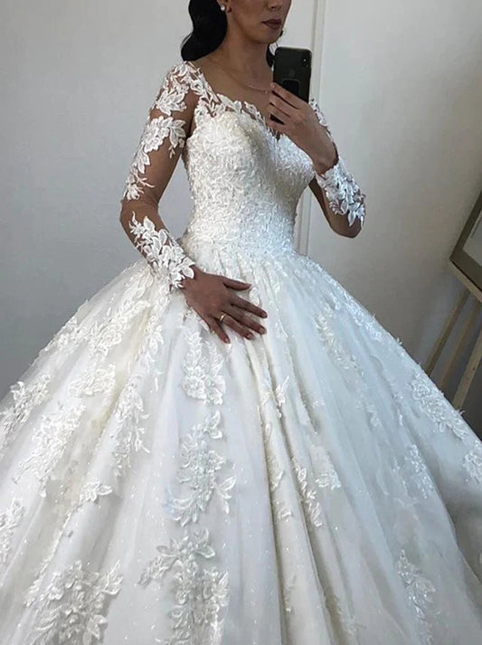 Elegant Ball Gown Wedding Dresses Illusion Scoop Long Sleeves Appliqued Sequins Tulle Sweep Train Bridal Gowns Custom Made