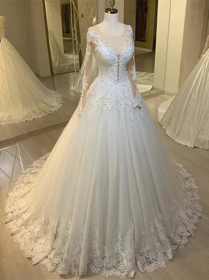 Charming Ball Gown Wedding Dresses Illusion Scoop Long Sleeves Appliqued Beads Tulle Sweep Train Bridal Gowns Custom Made