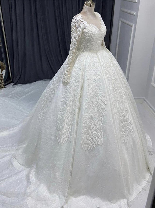 Romantic Ball Gown Wedding Dresses Illusion Scoop Long Sleeves Appliqued Beads Sweep Train Satin Bridal Gowns Custom