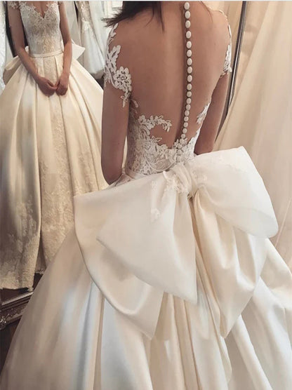 Romantic Ball Gown Wedding Dresses Sweetheat Appliqued Bowknot Cap Sleeves Court Train Satin Bridal Gowns Custom Made