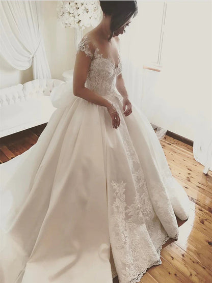 Romantic Ball Gown Wedding Dresses Sweetheat Appliqued Bowknot Cap Sleeves Court Train Satin Bridal Gowns Custom Made