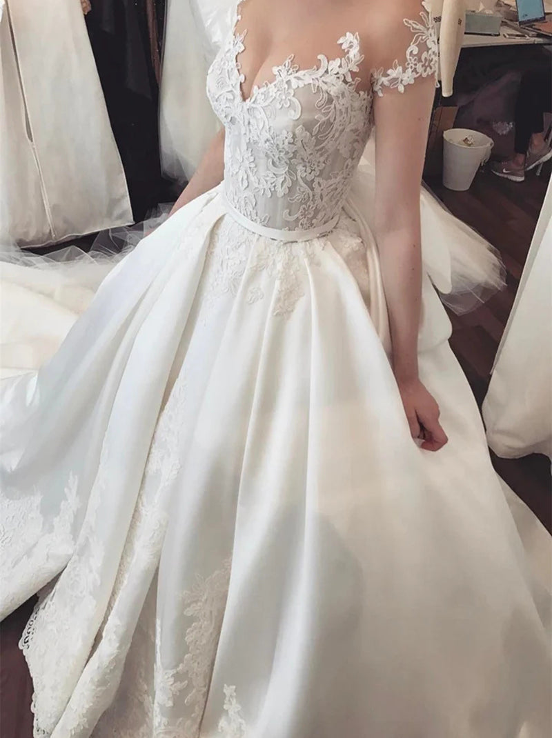 Romantic Ball Gown Wedding Dresses Sweetheat Appliqued Bowknot Cap Sleeves Court Train Satin Bridal Gowns Custom Made