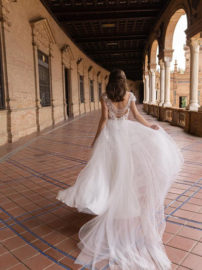 Simple & Elegant A-Line Wedding Dresses V-Neck Pleated Appliqued Cap Sleeves Tulle Sweep Train Bridal Gowns With Slit