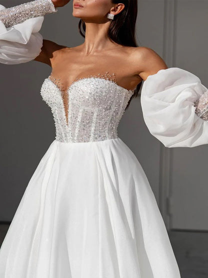 Gorgeous A-Line Beach Wedding Dresses Sweetheart Beads Puffy Sleevels Organza Sweep Train Bridal Gowns With Slit