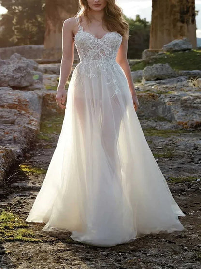 Modern A-Line Beach Wedding Dresses Spaghetti Appliqued Beads Tulle Sweep Train Bridal Gowns Custom Made