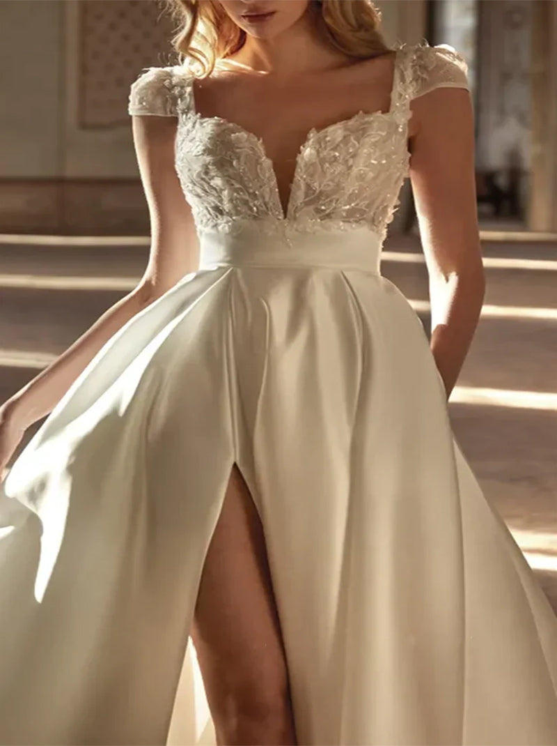 Gorgeous A-Line Beach Wedding Dresses Sweetheart Appliqued Cap Sleevels Satin Sweep Train Bridal Gowns With Slit