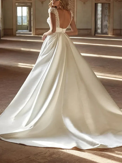 Gorgeous A-Line Beach Wedding Dresses Sweetheart Appliqued Cap Sleevels Satin Sweep Train Bridal Gowns With Slit