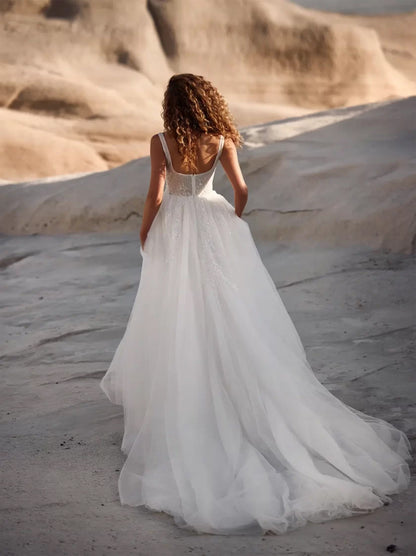 Classic & Elegant A-Line Boho Beach Wedding Dresses Spaghetti Beads Appliqued Sleeveless Tulle Sweep Train Bridal Gowns With Slit